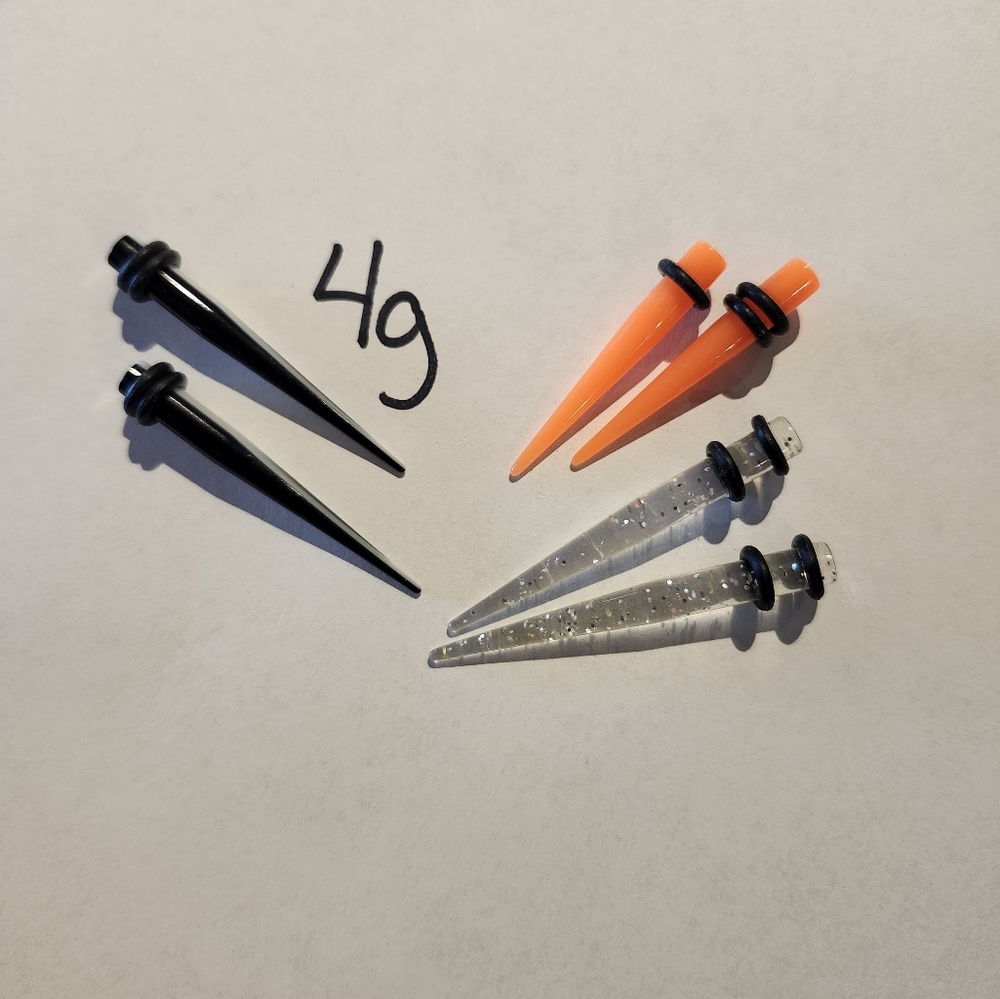 Set of 3 Pairs of Ear Tapers in Black, Orange, and Clear Sparkle